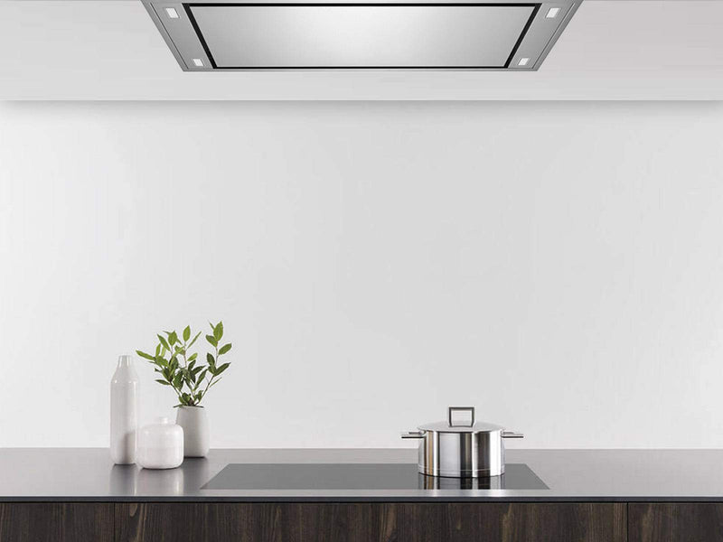 Flush stainless steel Horizon unit integrated into a modern kitchen ceiling above a cooktop.