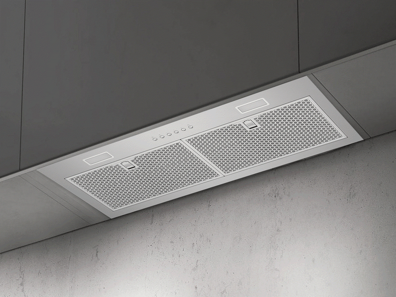Victory Q1 range hood insert installed flush in a modern dark cabinet with stainless steel filters and push-button controls
